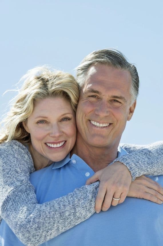 Sarah and David smiling together